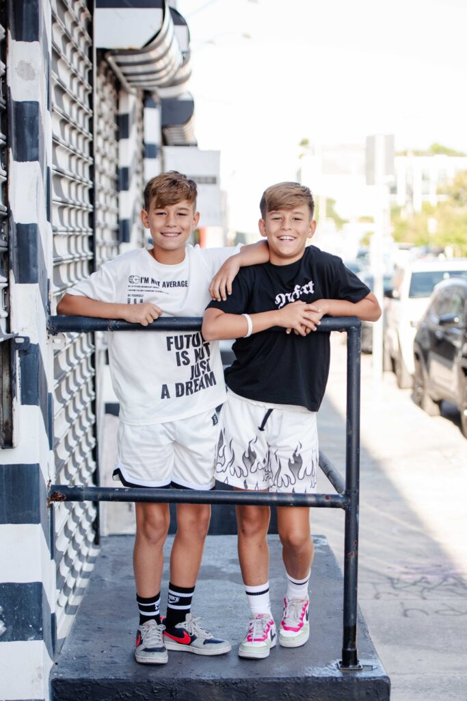 twin boys in front of wynwood building in miami